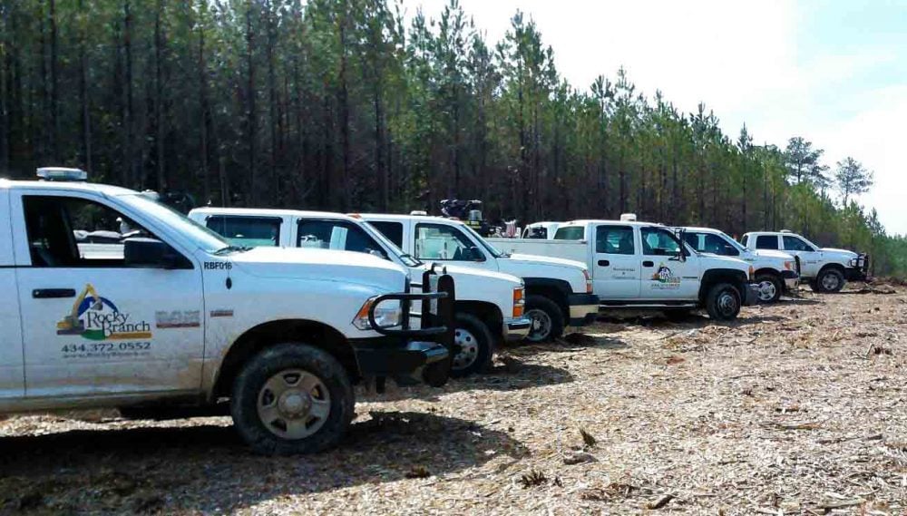 Line of Rocky Branch Contractor construction services vehicles fitted with Quartix Vehicle Tracking
