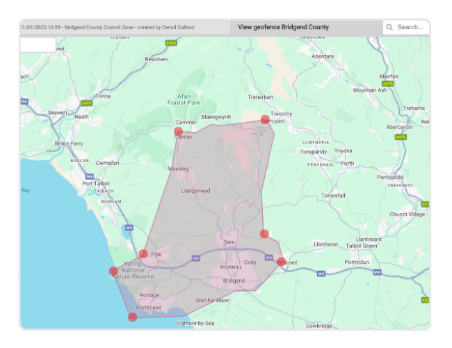 A map showing a shaded geofence area covering Bridgend County, Wales, with nearby towns, roads, and green areas visible.