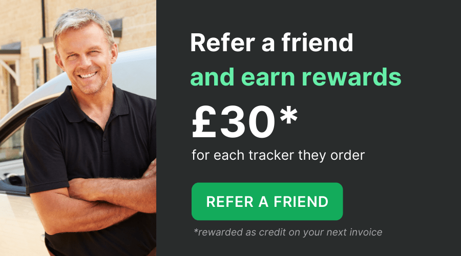 Smiling man stands by a vehicle; text promotes the Quartix customer referral programme, offering £30 credit for each friend referred who orders a tracker.