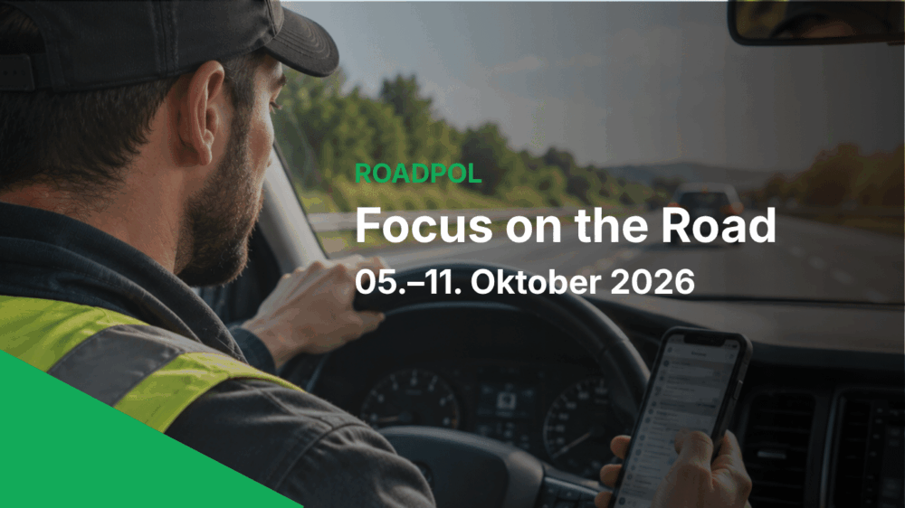 A man driving a car looks at his phone while holding the steering wheel, distracted from the task at hand. Text overlay reads: “ROADPOL Focus on the Road 05.–11. Oktober 2026.”.