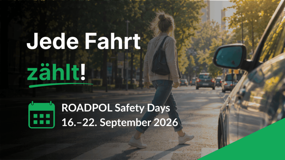 A woman crosses a city street at a crosswalk; text promotes ROADPOL Safety Days, 16–22 September 2026, with the slogan “Jede Fahrt zählt!” in German.